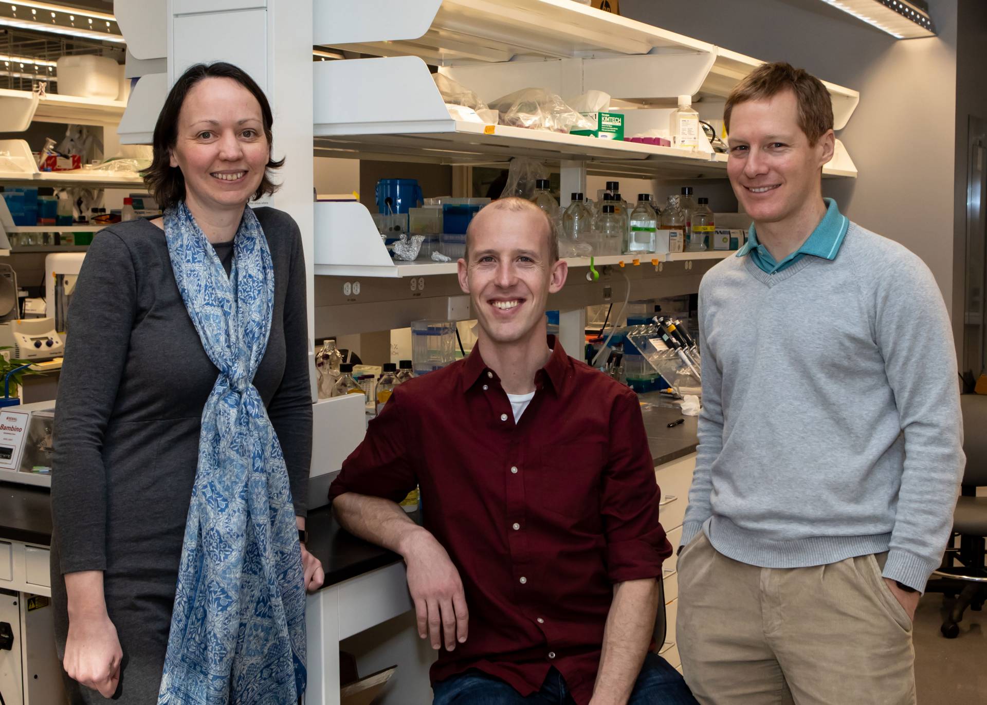 Three researchers pose for photo in lab: Nelson, Toettcher and Kosmrlj