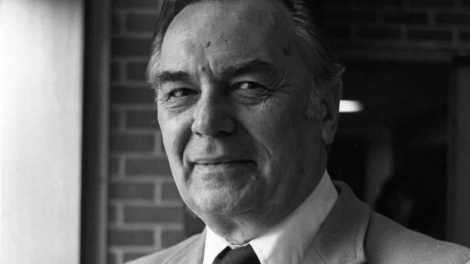 Black-and-white portrait of Professor George Luchak