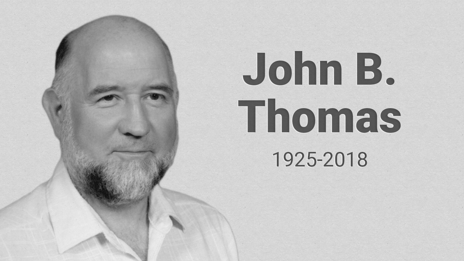 Portrait of John B. Thomas with text "John B. Thomas 1925-2018"