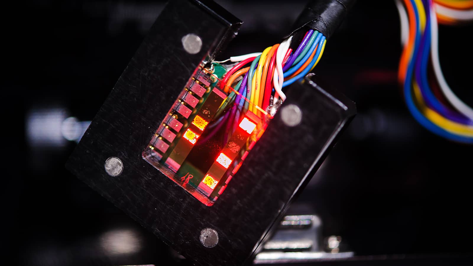 A colorful electronic device using L-E-D's that are lighted up.