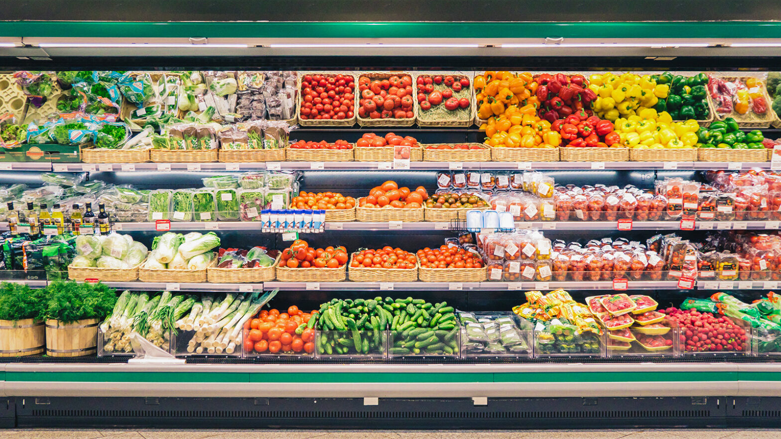 Fresh vegetables on shelves in supermarket