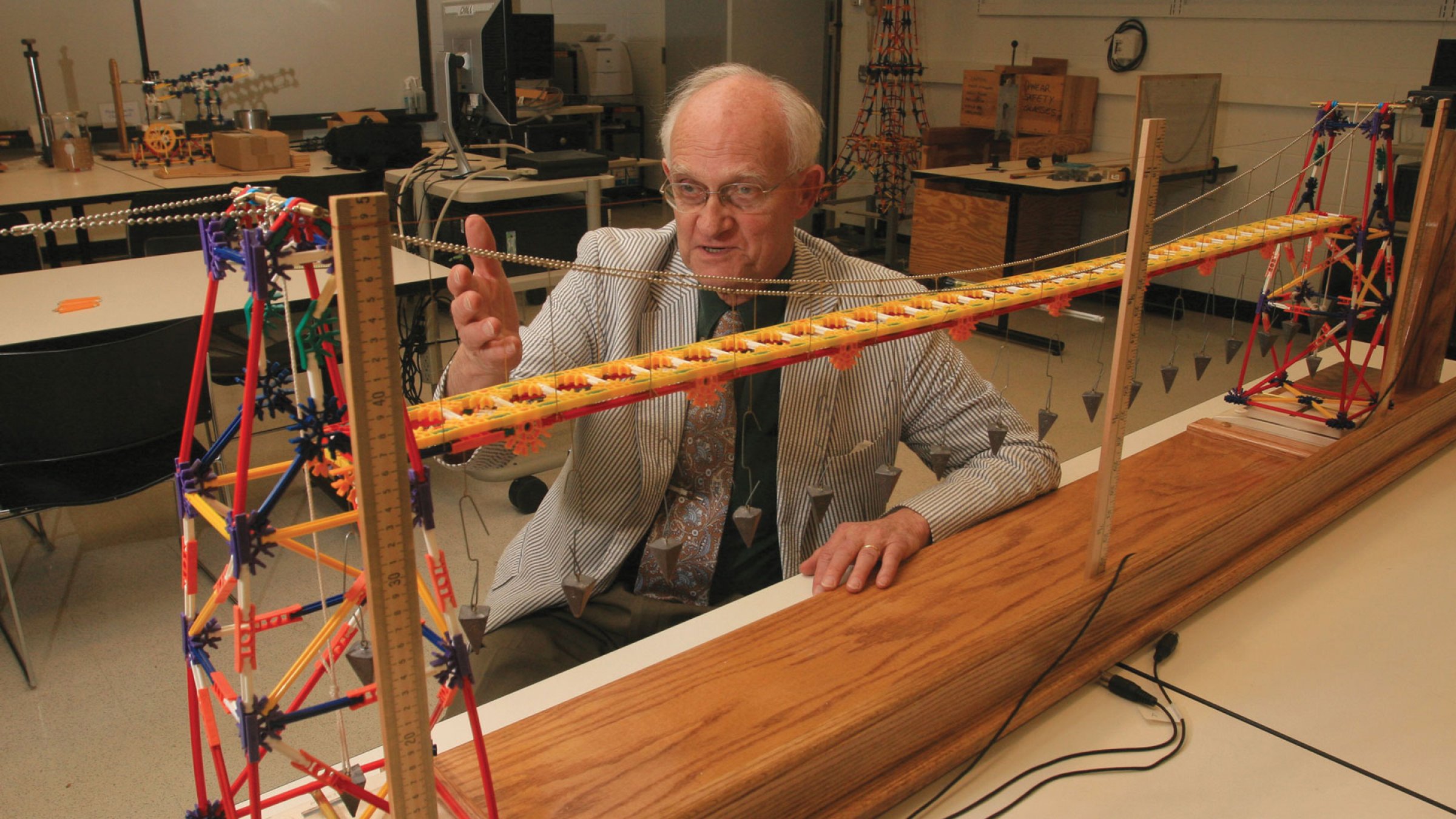 David Billington and a colorful bridge model