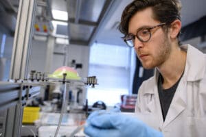 researcher controls inflatable elastics at a lab bench