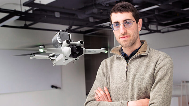 Michael Soskind stands with drone