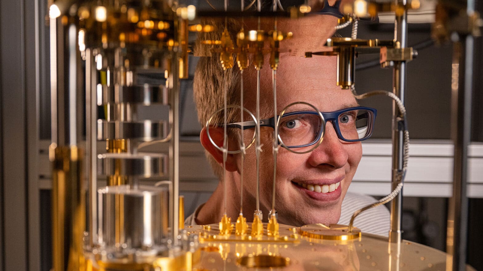 Portrait of researcher with quantum computer.