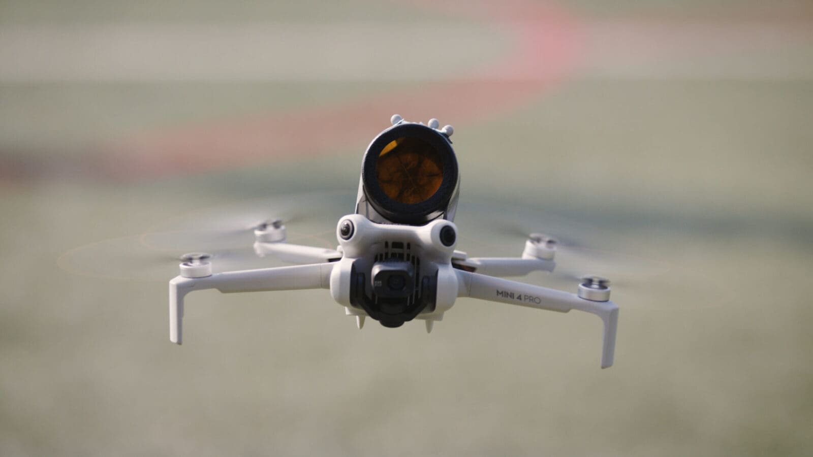 A white drone in flight