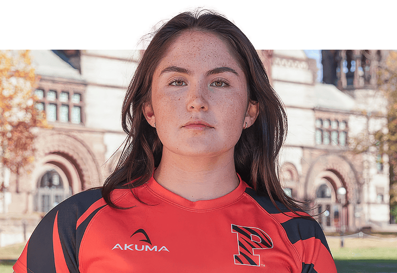 Portrait of Zoe Koniaris on the Princeton campus, wearing her rugby uniform.