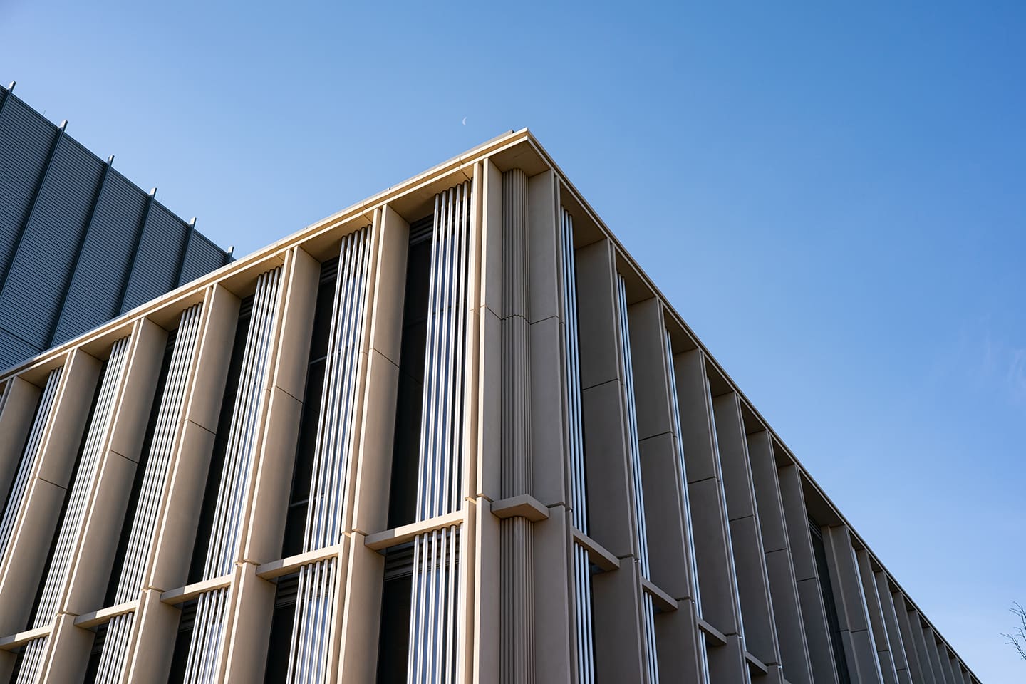 Corner of the building and a bluebird sky.