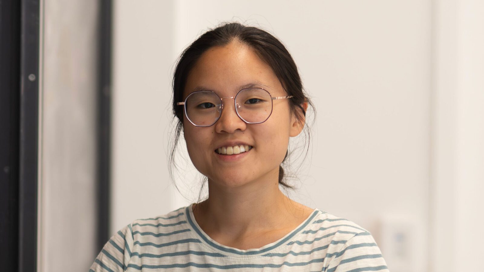 Portrait of Debbie Zhuang.