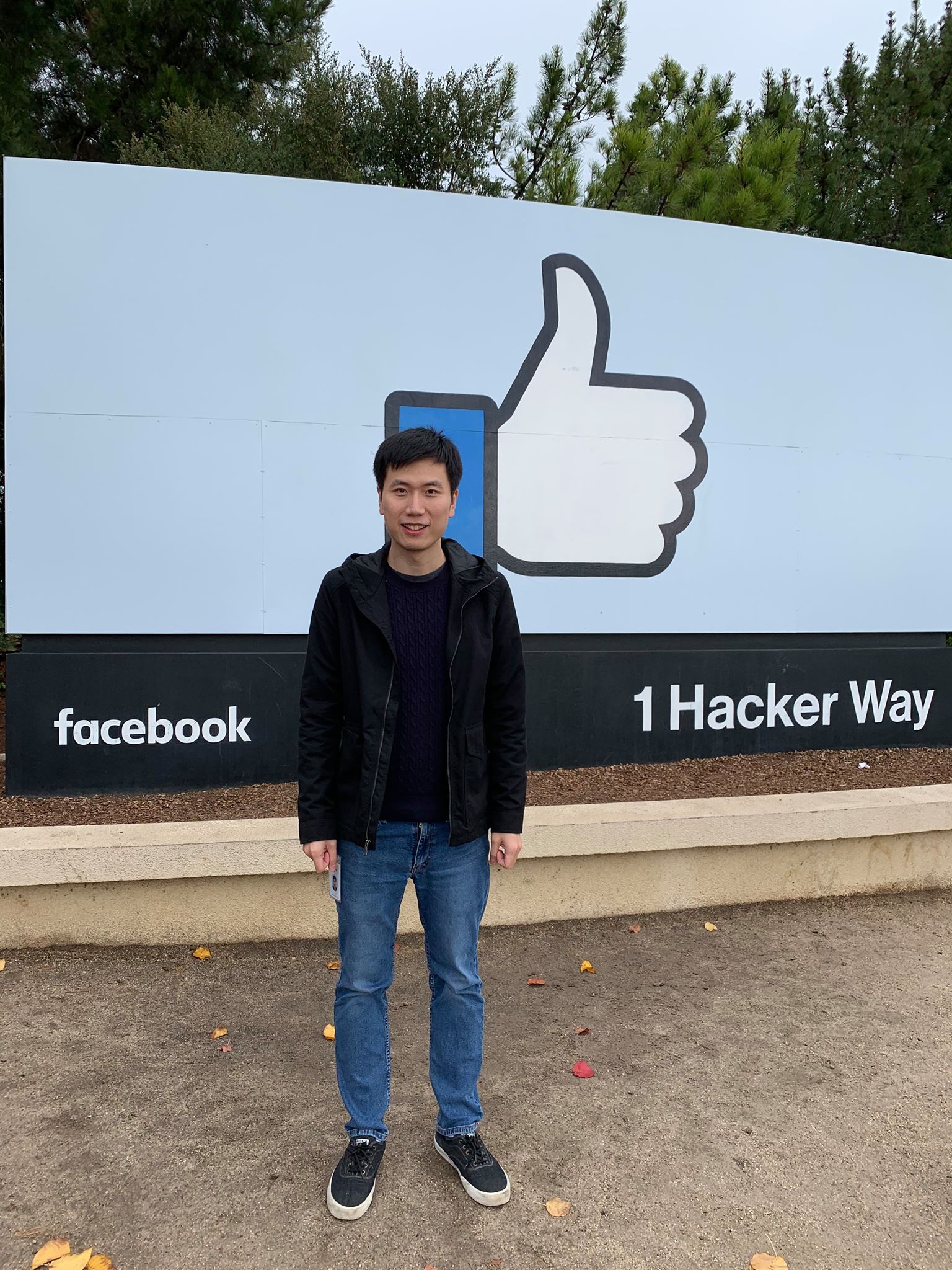 Xiaoliang Dai stands outside of Facebook HQ