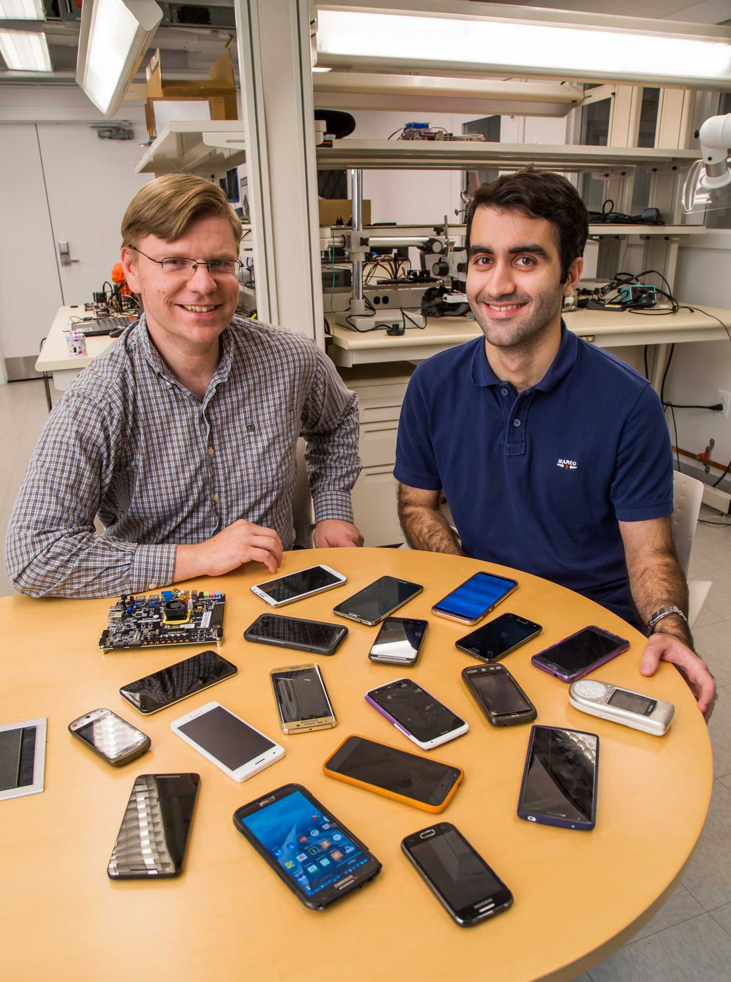 researchers with smart phones