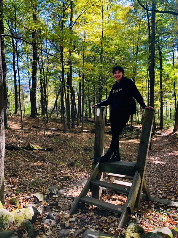 Anastasia enjoys a hike in the wooded areas surrounding Princeton University campus.