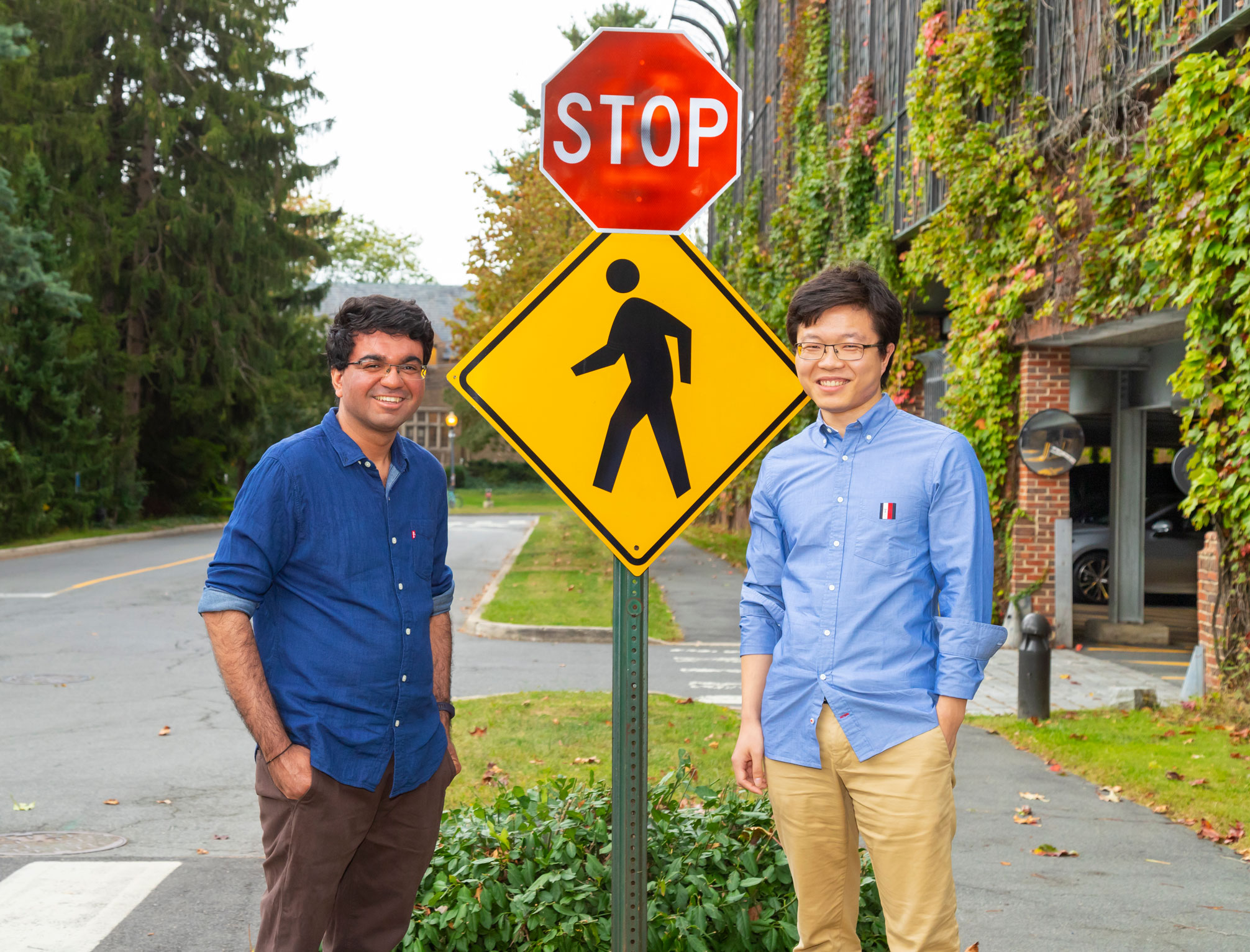 Researchers with stop sign