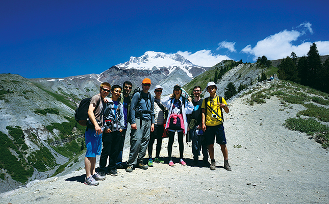 Research group poses during mountaineering trip