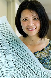 Lynn Loo with her plastic electronics sheet