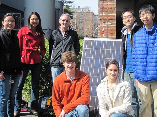 Professor Jay Benziger (rear center) served as adviser to an<br /> undergraduate team that won an international hydrogen energy competition. Members of the 10-student team<br /> posing with their device are, from left: Yin Liang, Jane Yang, Alex Tait, Nicole Businelli, Leo Shaw and<br /> Michael Zhu.