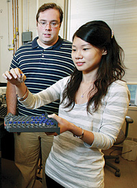 Professor and student in lab